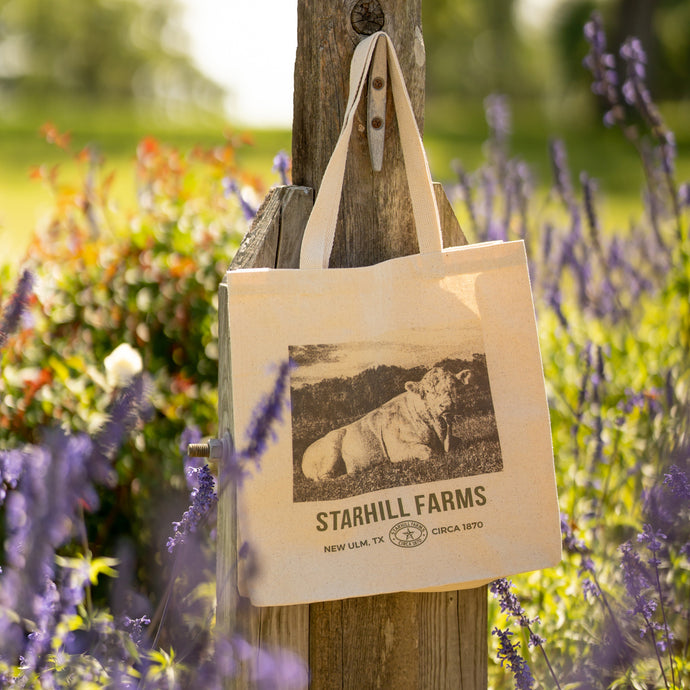 Canvas bag hanging by wildflowers at StarHill Farms