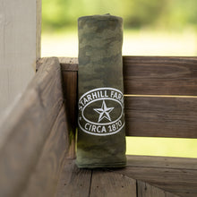 Load image into Gallery viewer, A comfy camo StarHill Farms Blanket pictured at the Ranch House